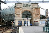 Grand entrance. Platform 11a at Glasgow Central in Sept 2007. After removal of the buildings in the centre of the picture this platform will be realigned and rerouted through the arch and into the train shed (taking over an area currently occupied by the station car park) it will eventually become the platform used by <I>Glasgow Airport Rail Link</I> services. Responsibility for the GARL project was recently handed over from SPT to Transport Scotland. [Plans now changed - see subsequent entries]<br><br>[John Furnevel 09/09/2007]