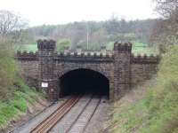 The artificial tunnel at Gisburn, on the line between Hellifield and Clitheroe, is only 157 yards long. It was built to protect the view from Gisburne Park (sic) and the castellations on the far portals can also be seen in this view towards Hellifield in April 2008. The remains of Gisburn station are just behind the photographer. (SD 826489) <br><br>[Mark Bartlett 28/04/2008]