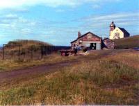 Looking back at the passenger station at Macduff in June 1979. The building still survives in good condition as a fishing net and rope repair business, although the site is less recognisable as a railway terminus. <br><br>[John Williamson /06/1979]