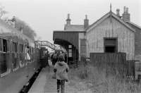 View east along the platform at Cambus towards the level crossing during a DMU railtour in 1974.<br><br>[Bill Roberton //1974]