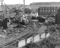 James A White (formerly T W Ward) scrapyard in the 1980s. The yard, served by a siding off the Rosyth branch, operated two John Fowler 0-4-0DM shunters.  This yard scrapped many ex-BR steam locomotives, including four of the Britannia Pacifics.<br><br>[Bill Roberton //]