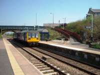 Northern Rail has really tidied up the East Lancashire stations recently. This is Hapton looking towards Rose Grove as 142003 pulls in on a Colne to Blackpool South service. <br><br>[Mark Bartlett 08/05/2008]