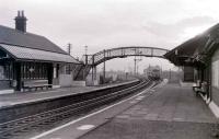 A Metro Cammell 3-car set forming the 1532 ex-Kilmarnock runs into Lugton on Saturday 5 November 1966. This was the last day on which scheduled passenger trains stopped at Lugton with official closure taking place two days later on Monday 7th.<br><br>[Colin Miller 05/11/1966]