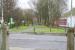 View east across the A908 Moss Road, Tillicoultry, on 6 March 2008 from a point between the platforms of the late Tillicoultry station (behind camera), over the long gone level crossing. Ahead lies the route of the former Devon Valley line running towards Dollar. The sign for the <I>Devon Way</I> now warns horses not to exceed a canter! [See image 3336]<br><br>[John Furnevel 06/03/2008]