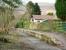 Platform remains at Dollar on the former Devon Valley Line on 6 March 2008 looking west along what is now the <I>Devon Way</I> towards Tillicoultry. [See image 27868]<br><br>[John Furnevel 06/03/2008]