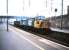 37 051 takes a lightweight freight south through Motherwell in October 1987.<br><br>[David Panton /10/1987]