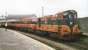 The 1830 Dublin Connolly to Sligo train about to restart from Mullingar, County Westmeath, in July 1993.<br><br>[David Panton /07/1993]