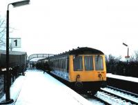 DMU 116 389 picks up passengers at Nitshill on a chilly December day in 1985 with a service for Glasgow Central.<br><br>[David Panton /12/1985]