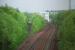 When the M80 was built (partly along the course of <i>The Switchback</i>) the Garnkirk and Glasgow Railway, which had enjoyed a straight course for over 150 years, was diverted. The original course is to the left and the new route over an impressively massive bridge is to the right. Balornock/St Rollox shed was to the left. View looks east.<br><br>[Ewan Crawford 10/05/2008]