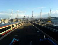 View south at Stirling on 13 March showing the new pedestrian bridge under construction across the station. On the left stands a First ScotRail Glasgow - Stirling service, soon to be extended to Alloa. <br><br>[Veronica Inglis 13/03/2008]