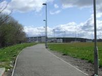 Looking east, the path runs along the approximate line of the trackbed of the Pasiely & Barrhead district railway at the location of Dykebar station. The location is now St. Andrews High School in Paisley. The building on the centre right in the background also sits on the trackbed, and it reappears at that point.<br><br>[Graham Morgan 05/04/2008]