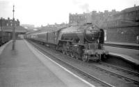 A2 Pacific 60535 <I>Hornets Beauty</I>, sporting a 64B Haymarket shedplate, with the 4pm  Waverley - Perth train at platform 2 of its home station in May 1959. The locomotive was eventually withdrawn in 1965 after some notable performances on the Edinburgh - Dundee - Aberdeen route. <br><br>[Robin Barbour Collection (Courtesy Bruce McCartney) 29/05/1959]