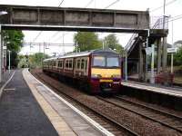 320 319 pauses at Garrowhill station on 17 May en route to Drumgelloch.<br><br>[David Panton 17/05/2008]