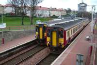 Looking back towards Glasgow Queen Street as Anniesland shuttles cross at Possilpark and Parkhouse on 23 February 2008. <br><br>[David Panton 23/02/2008]
