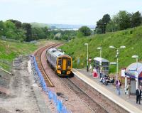 The 1125 Bathgate - Newcraighall service arriving at Livingston North on 9 June 2008 with track now in place on the new formation.<br><br>[James Young 09/06/2008]