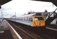 A freshly outshopped 305 519 stops at Prestonpans in April 1995 en route to North Berwick.<br><br>[David Panton /04/1995]