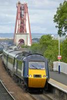 09.50 Aberdeen-Kings Cross with <I>white-stripe</I> power car leading NXEC stock runs off The Forth Bridge and through Dalmeny on 11 June.<br><br>[Bill Roberton 11/06/2008]