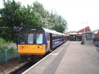 An Exeter St Davids service with 142009 waits to leave Exmouth interchange station. This is located a little further back along the branch than the station in the earlier photograph by Ian Dinmore but it is still close to the town centre and enjoys a half hourly service to Exeter. <br><br>[Mark Bartlett 18/06/2008]