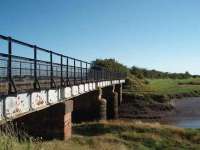 The Glasson Dock branch bridge over the tidal River Conder carried its last train in 1964 but is now part of a cycle way from Lancaster. View towards Glasson Dock. Map Ref SD 456560 <br><br>[Mark Bartlett 23/06/2008]