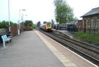 A Glasgow - Birmingham Voyager, diverted due to engineering work, crawls west through Clitheroe station on Saturday 17 May. The train is following in the wake of a local Clitheroe - Manchester Victoria DMU (as far as Blackburn) as it heads towards the WCML to regain its normal route south.  <br><br>[John McIntyre 17/05/2008]