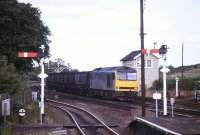 A class 60 takes a MGR train southwest through Barnetby in 1992.<br><br>[Ian Dinmore //1992]