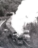 The last steam locomotive to be built by British Railways in 1960, class 9F 2-10-0 92220 <I>Evening Star</I>, pictured leaving Grosmont (and how) in 1986 while operating on the North York Moors Railway. <br><br>[Colin Miller //1986]