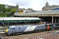 The first of the class to be turned out in full <I>National Express East Coast</I> livery, 91111 stands at Waverley on 10 July 2008 on a Glasgow Central - Kings Cross service. <br><br>[Bill Roberton 10/07/2008]