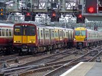 314206 and 334007 drawing into Glasgow Central on 16th June<br><br>[Graham Morgan 16/06/2008]
