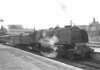 Stanier Pacific 46257 <I>City of Salford</I> restarts a Carlisle - Glasgow train from Motherwell in May 1963.<br><br>[Colin Miller /05/1963]
