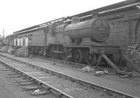 Class 2P 4-4-0 40615 stands on the scrap road at Corkerhill shed in July 1962.<br><br>[Colin Miller 11/07/1962]