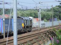 66415 at the Elderslie Loop having just been given signals to join the main line after loading up with containers at WH Malcolm on a container service to Newbiggin, Cumbria, on 16th July.<br><br>[Graham Morgan 16/07/2008]