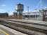 An old water tower still stands at the western end of Cardiff Central station with platform 0 in front of it. A corner of the Millennium Stadium is in the background on the right. 12 April 2008.<br><br>[John McIntyre 12/04/2008]