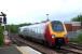 A CCT Voyager about to pass through the platforms at Ladybank heading south in May 2008. The brick building to the right of the train is a remote automatic signal cabin.<br><br>[Brian Forbes /05/2008]