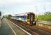 158 703 with a southbound service at Portlethen in May 1999.<br><br>[David Panton /05/1999]