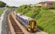 Looking back towards Livingston North on 9 June 2008 with 158714 having just left the station heading for Edinburgh.<br><br>[James Young 09/06/2008]