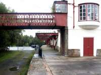 The former Crieff branch platform and disused section of footbridge at Gleneagles in September 2004. View north with the operational platforms and footbridge off to the right [see image 1621].<br><br>[John Furnevel 11/09/2004]