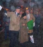John Swinney MSP flags off of the 0712 service to Edinburgh in front of an assembled crowd at Blair Atholl on 15 December. [This is the first train booked to start at Blair Atholl since withdrawal of the local service in May 1965.]<br>
<br><br>[Councillor Kate Howie 15/12/2008]