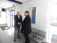 Alistair Findlay is congratulated by Councillor John McGinty following the unveiling at Bathgate station on 24 March 2011 [see news item]. <br><br>[First ScotRail 24/03/2011]