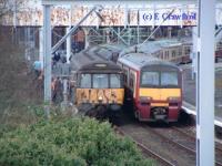 Last Blue Train about to leave Helensburgh Central to run empty to Yoker.<br><br>[Ewan Crawford 30/12/2002]