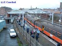 Last Blue train on arrival at Helensburgh Central. View looks west.<br><br>[Ewan Crawford 30/12/2002]