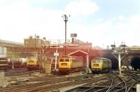 The hive of activity that was <I>'Kings Cross Loco'</I>, the stabling and fuelling point squeezed into the area between the end of the platforms and Gasworks Tunnel. The location is seen here on 6 August 1968 with (Left to Right) Brush Type 4s D1531, D1542 and D1556 amongst those making use of the facilities that day.<br><br>[John Furnevel 06/08/1968]