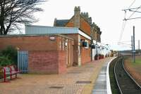 Platform view south at Dunbar station in December 2004. The single platform is located alongside a loop on the up side of the East Coast Main Line.<br><br>[John Furnevel 19/12/2004]