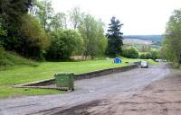 Remains at Grandtully on the Aberfeldy Branch in May 2003. Former goods yard and loading bank looking east towards Ballinluig. The area is now used as a camping and parking facility. <br><br>[John Furnevel 21/05/2003]