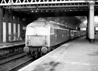 47707 <I>Holyrood</I> awaits departure time at Glasgow Queen Street on 2 November 1983 with a push-pull shuttle service for Edinburgh Waverley. <br><br>[John Furnevel 02/11/1983]