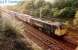 Freightliner heading east and about to turn south at Mossend East Junction.<br><br>[Ewan Crawford //]