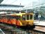 A city bound Tyne & Wear Metro service, destination St James, runs into Tynemouth station on 10 July 2004 in bright sunshine.<br><br>[John Furnevel 10/07/2004]