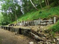 The platform still exists but is showing a marked deterioration since my last visit. The name board has gone and there is evidence of subsidence. [See image 39049]<br><br>[John Gray 26/07/2008]