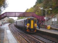 An East Kilbride service formed by 156 492 pulls up amongst the Autumn leaves at Clarkston on 13 October 2007.<br><br>[David Panton 13/10/2007]