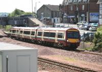 The 12.18 Glasgow Queen Street - Alloa service pulls away from the Larbert stop on 3 July 2008. <br><br>[John Furnevel 03/07/2008]
