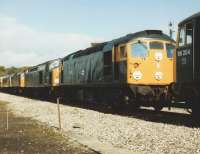 26019 flanked by 40106 & 86204 at Carlisle Upperby on 12 September 1982.<br><br>[Colin Alexander 12/09/1982]